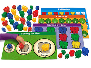 Instruction sheet, 4 activity mats, and 36 elephant counters.
