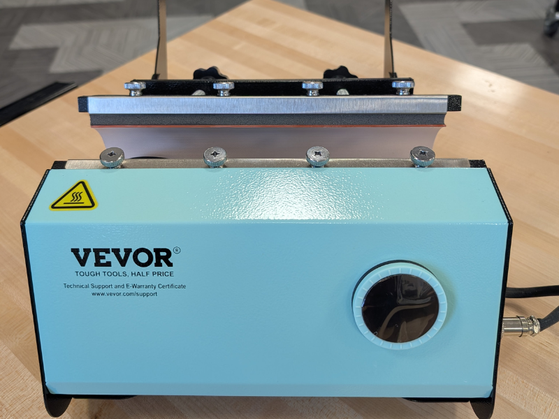 Vevor Tumbler Press machine on a wooden table