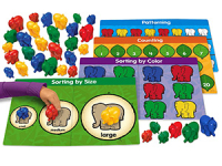 Instruction sheet, 4 activity mats, and 36 elephant counters.