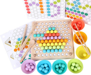 77 plastic beads, chopsticks, spoon, tweezers, muffin cups, baseplate, and pattern cards.