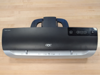 Black GBC Fusion 3000L Laminator machine sitting on a wooden table