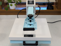 A white Vevor Heat Press machine on a white countertop